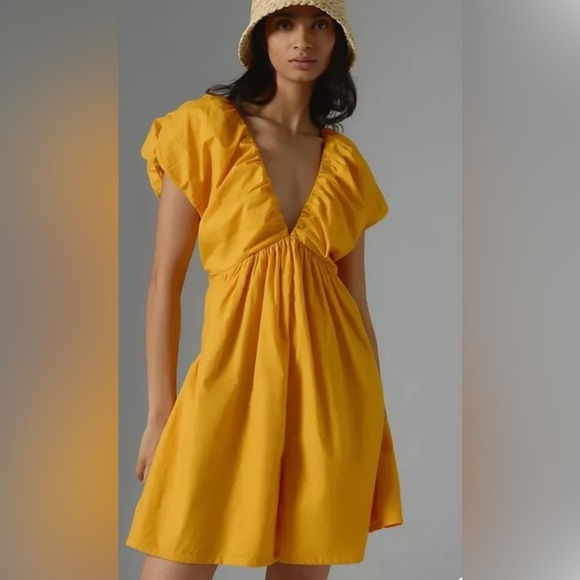 Anthropologie Pants - Anthropologie V Neck Ruched Romper size M